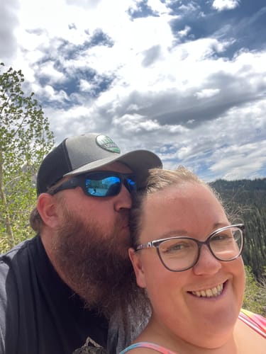 Customer's outdoor selfie with another person, showing the reviewer feeling energized after using Primal Testosterone Booster