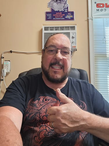 Reviewer gives a happy thumbs-up in their photo for Primal Reindeer Testosterone Support.