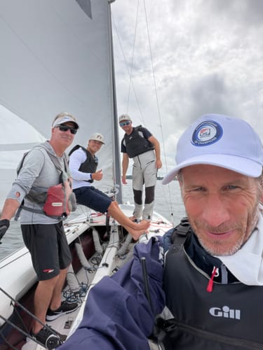 Reviewer on a sailboat with a team, enjoying the energy benefits of Primal Testosterone Booster.